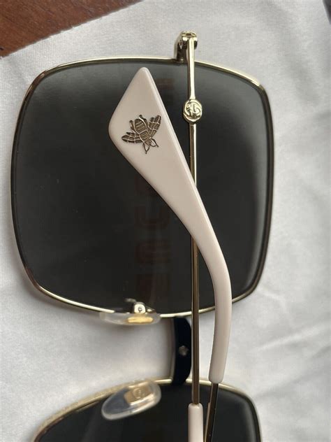 Gucci GG0414S 002 Sunglasses Gold 